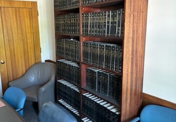 Conference table, chairs, credenza, file cabinets, book shelves