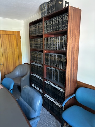 Conference table, chairs, credenza, file cabinets, book shelves