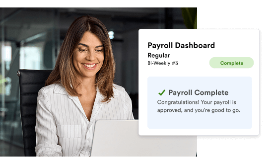 woman at a laptop with payroll dashboard overlay