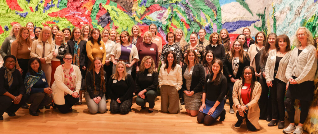 Women Take the Lead attendees group photo at the New Britain Museum of American Art